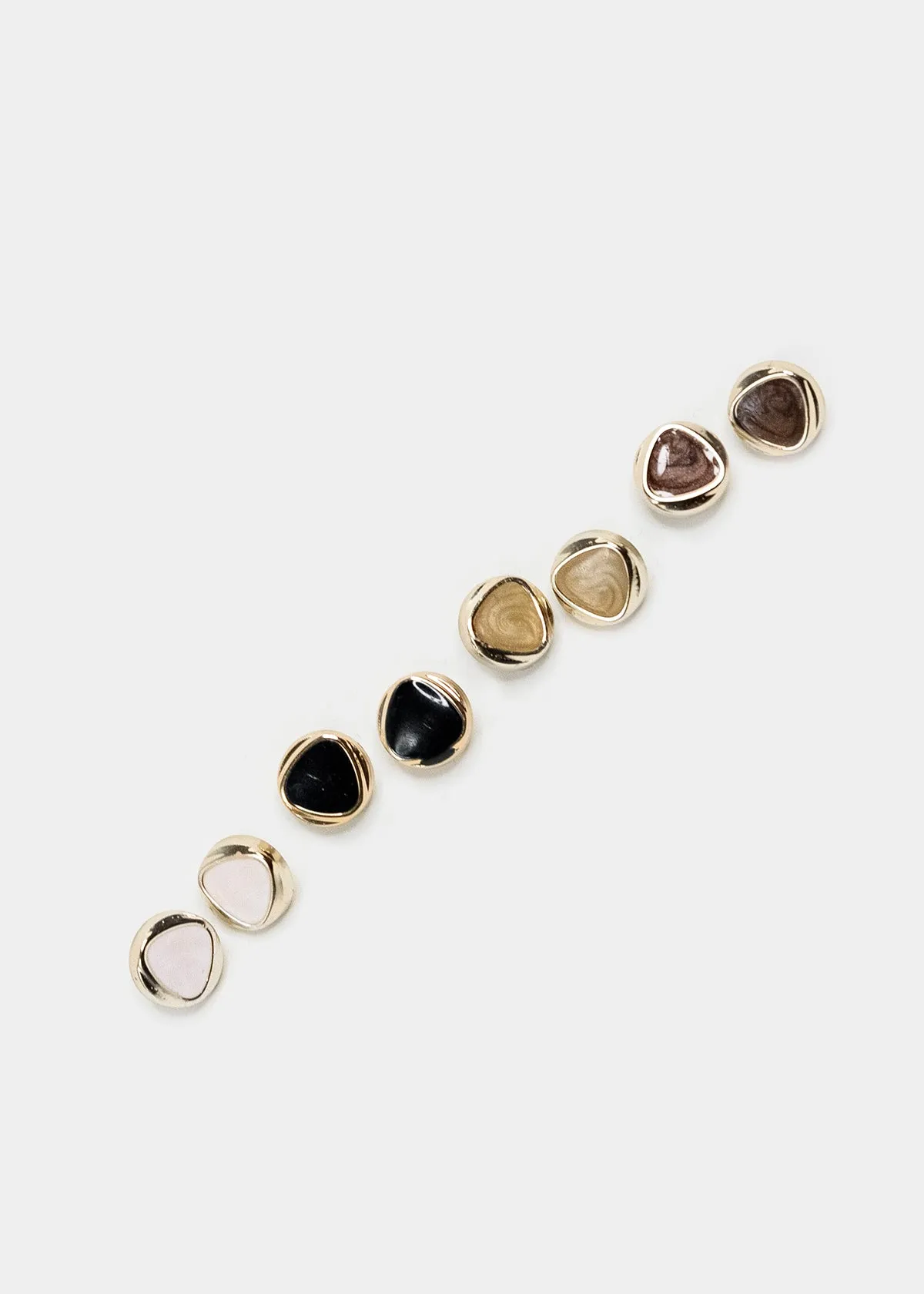 Set 4 piezas aretes triángulo sold by Shasa