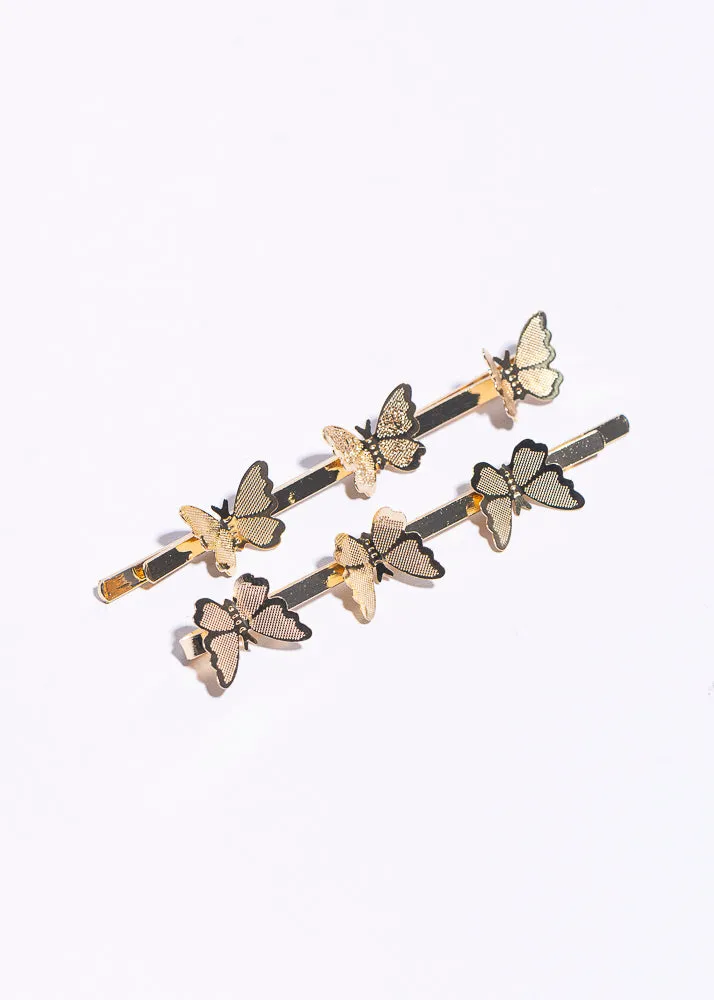 Set 2 piezas pasadores mariposa sold by Shasa