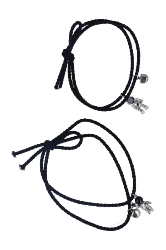 Set 2 Pulseras Astronauta sold by Shasa