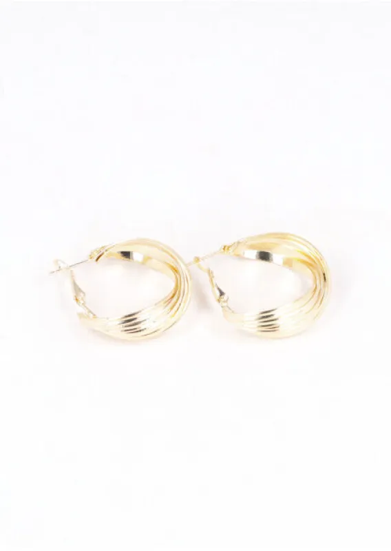 Arracadas metálicas textura sold by Shasa