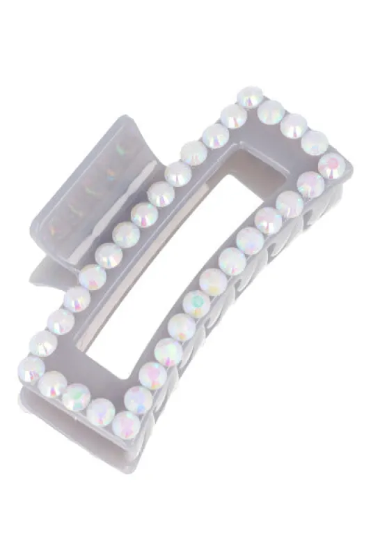 Pinza brillos tornasol sold by Shasa