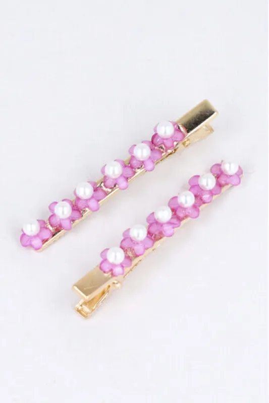 Set 2 piezas pasador flores sold by Shasa