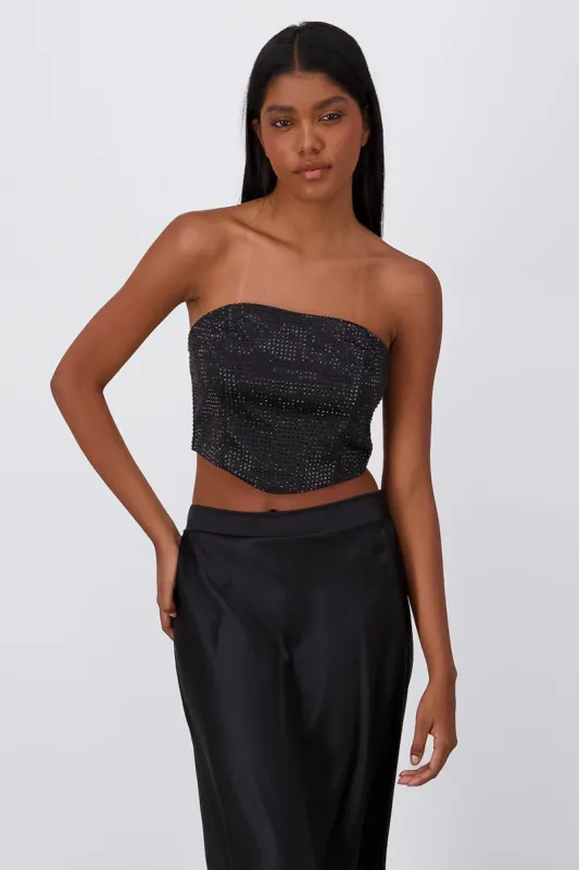 Top strapless con brillos sold by Shasa