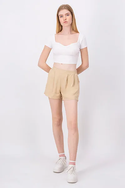 Short pinzas elástico sold by Shasa