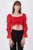 Blusa crop flores manga larga sold by Shasa