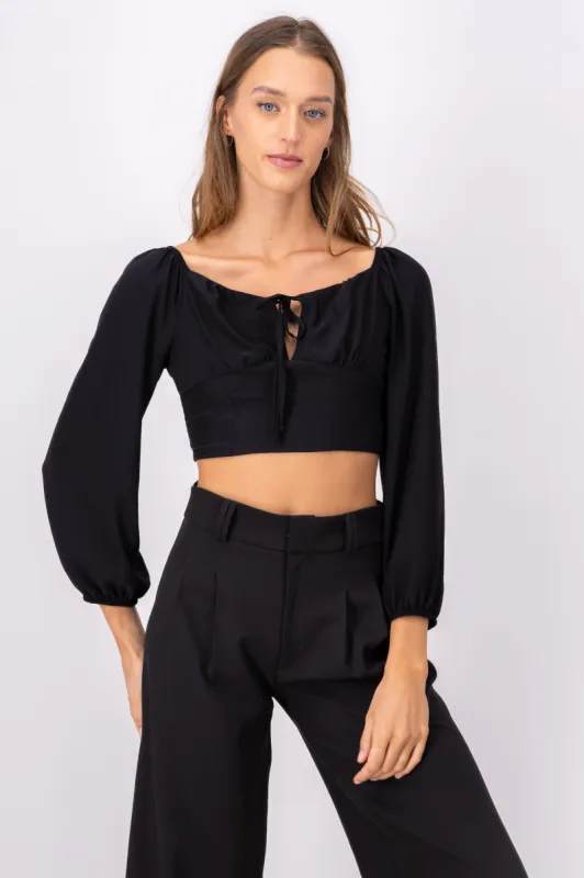 Blusa crop manga abullonada moño sold by Shasa