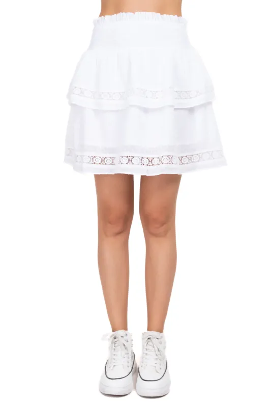 Falda mini smock bordes eyelets sold by Shasa