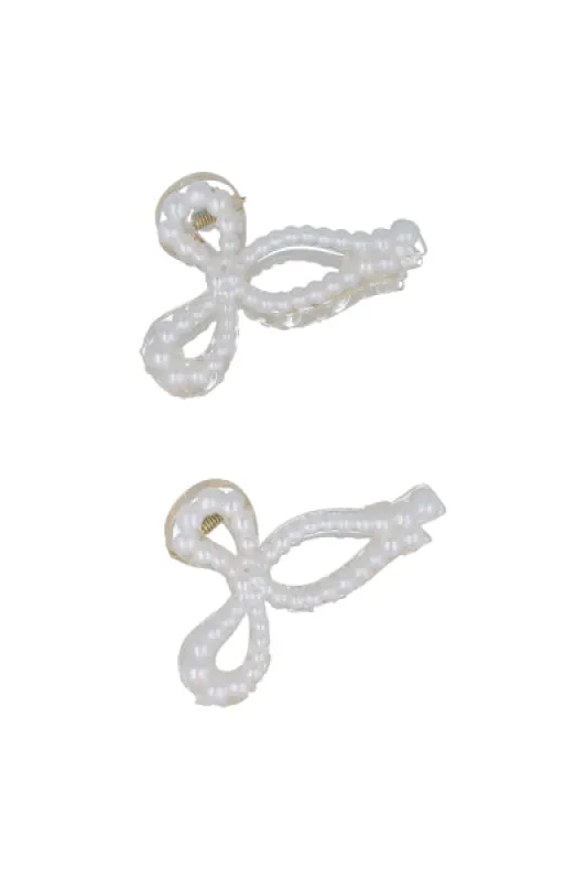 Pinza moño perlas sold by Shasa