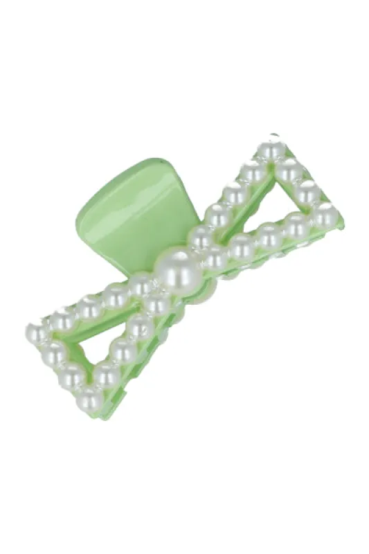 Pinza moño perlas sold by Shasa