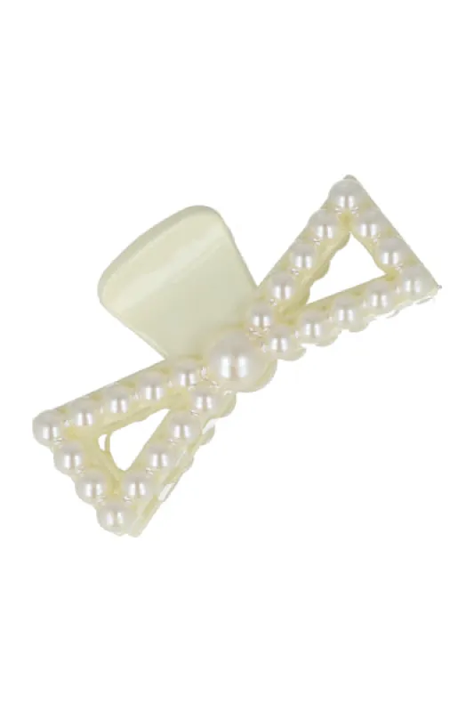 Pinza moño perlas sold by Shasa