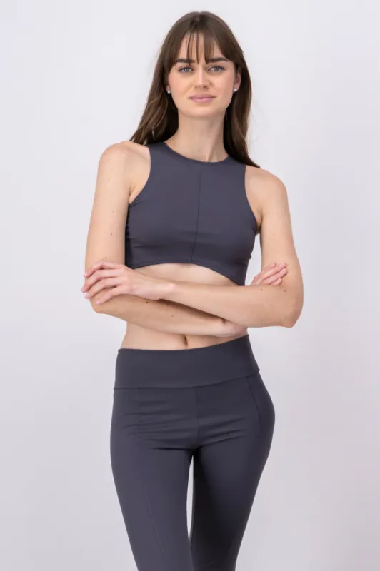 Top cuello alto liso costura sold by Shasa