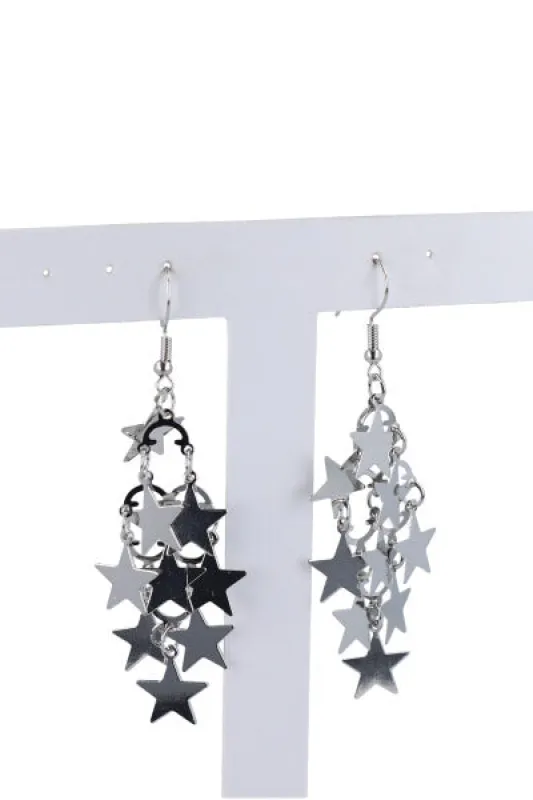 Aretes estrellas colgantes sold by Shasa