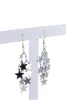Aretes estrellas colgantes sold by Shasa