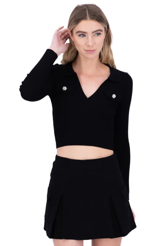 Blusa acanalada cuello polo sold by Shasa