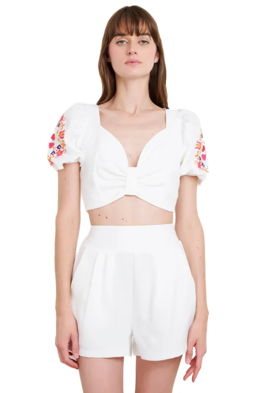 Top mangas abullonadas detalle bordado sold by Shasa