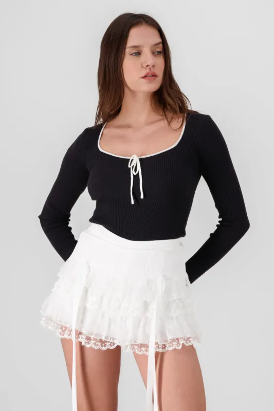 Sueter tejido con moño sold by Shasa