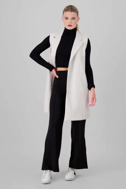 Chaleco largo liso sold by Shasa