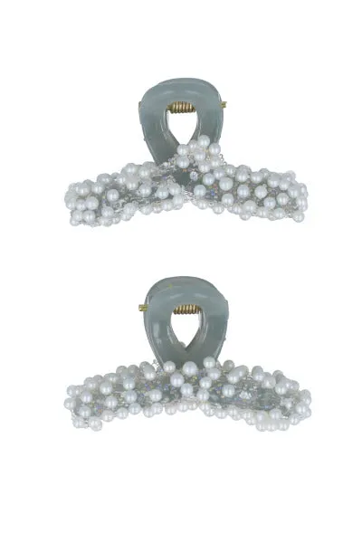 Set 2 pinzas largas perlas sold by Shasa