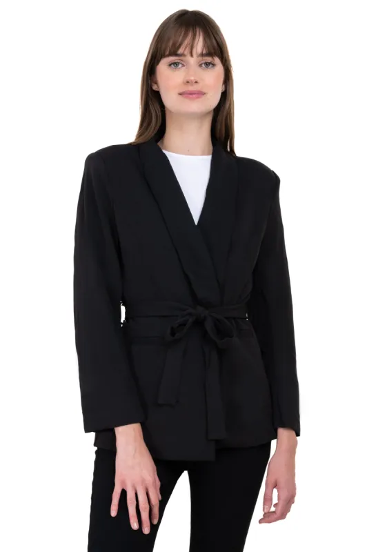 Saco con cinturon sold by Shasa