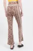 Pantalon tipo flare estampado tribal sold by Shasa