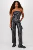 Jumpsuit strapless PU con cinturon sold by Shasa