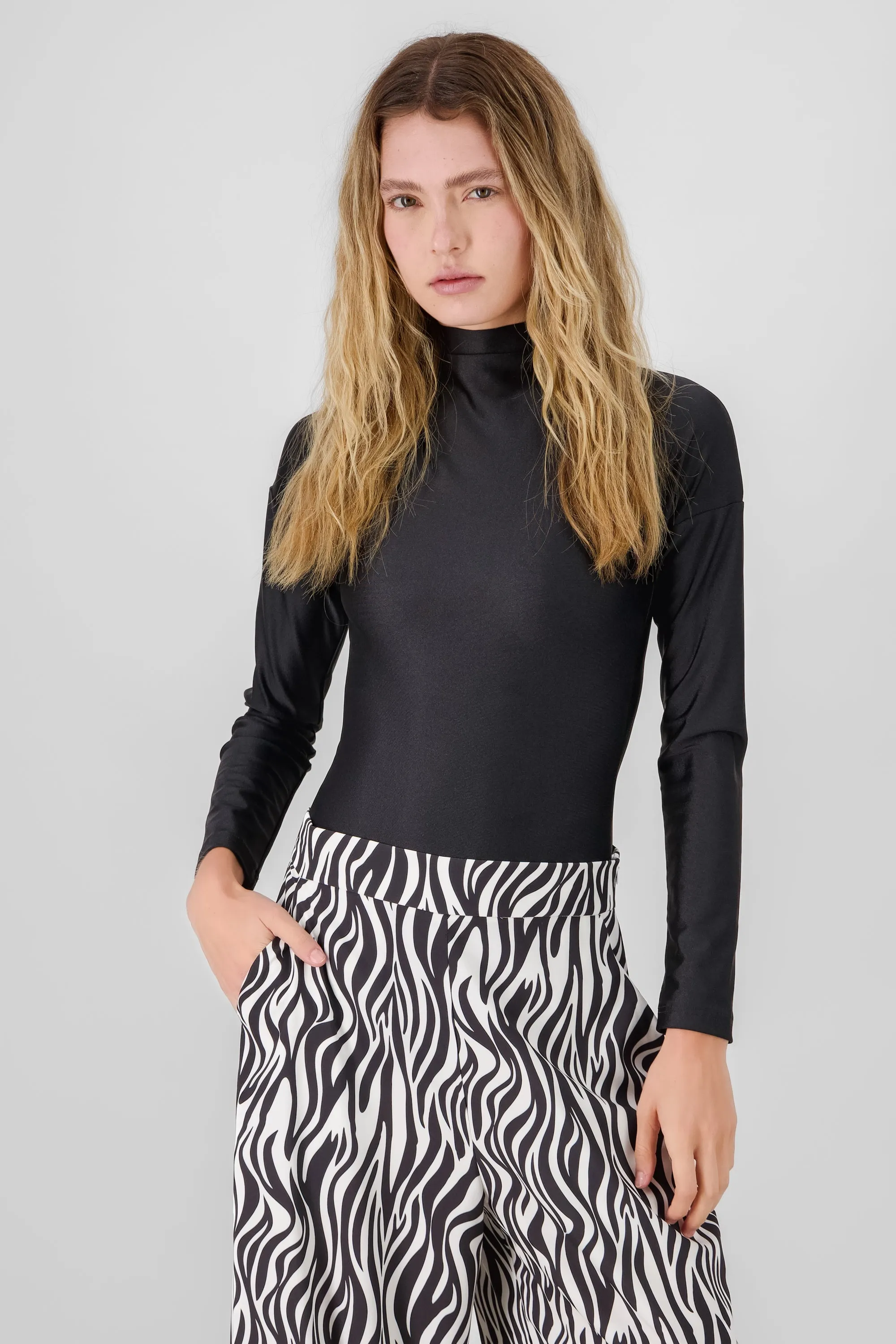 Bodysuit manga larga sold by Shasa