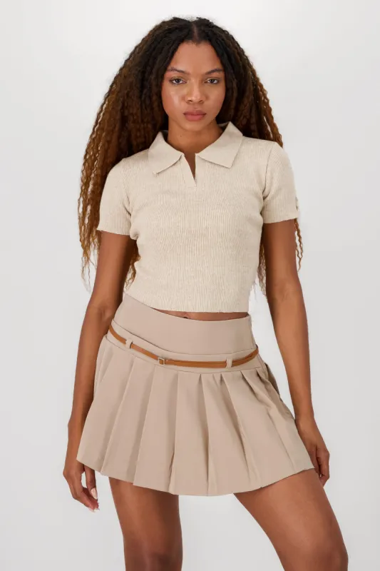 Top tejido cuello polo manga corta sold by Shasa