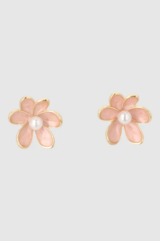 Aretes flores metalica nacarada sold by Shasa