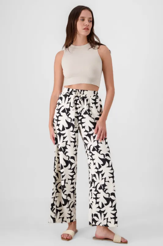 Pantalon amplio estampado tropical sold by Shasa