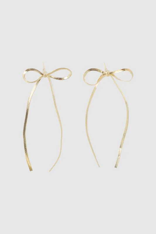 Aretes moño metal sold by Shasa
