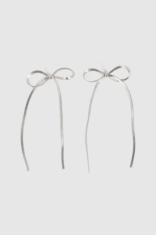 Aretes moño metal sold by Shasa