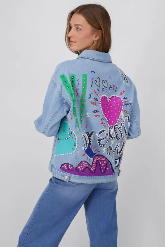 Chamarra trucker con estampado en espalda sold by Shasa