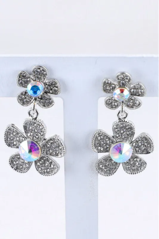 Aretes Doble Flor Brillos sold by Shasa