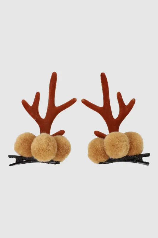 Set 2 broches pompón cuernos sold by Shasa