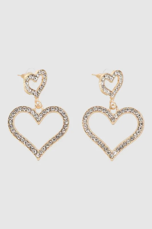 Aretes doble corazon brillos sold by Shasa