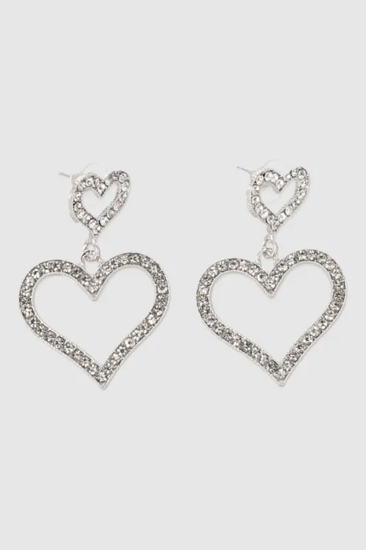Aretes doble corazon brillos sold by Shasa