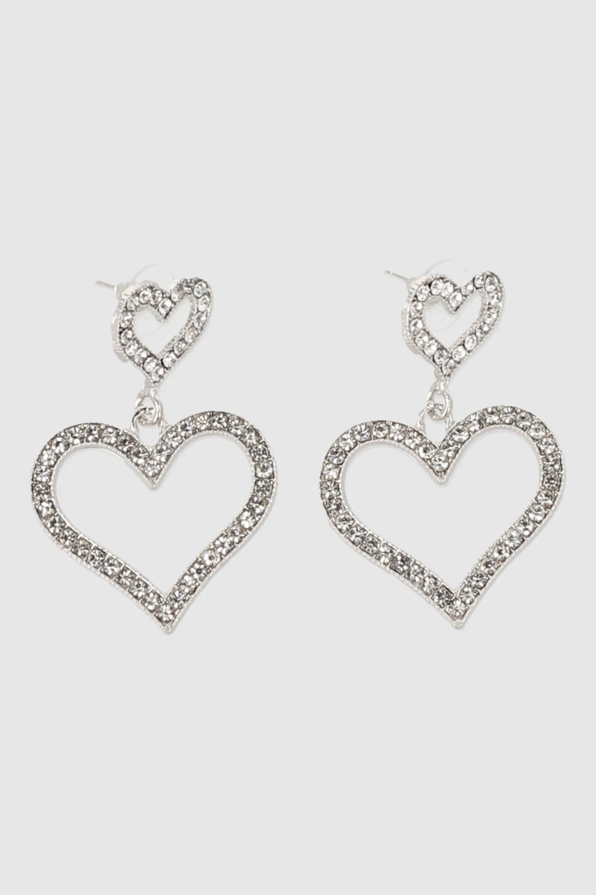 Aretes doble corazon brillos sold by Shasa