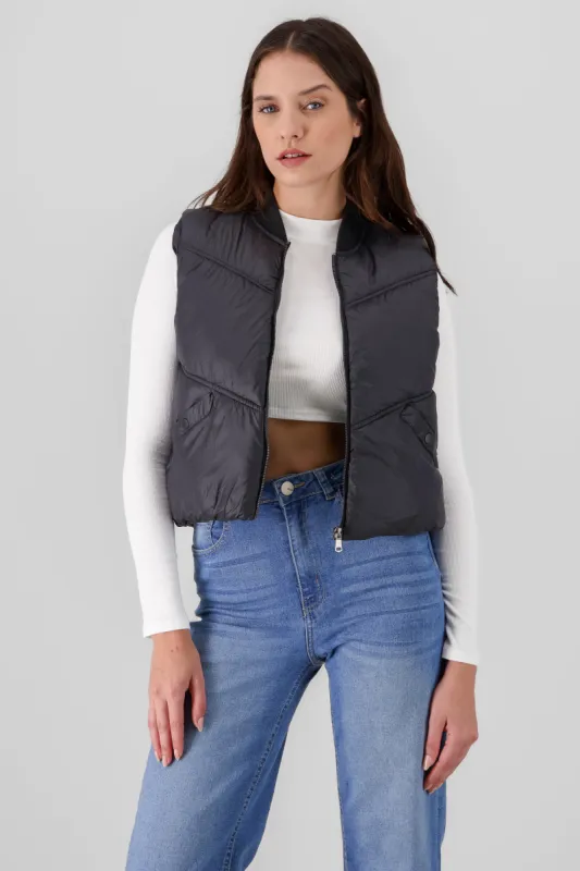 Chaleco mini puffer liso con bolsas sold by Shasa