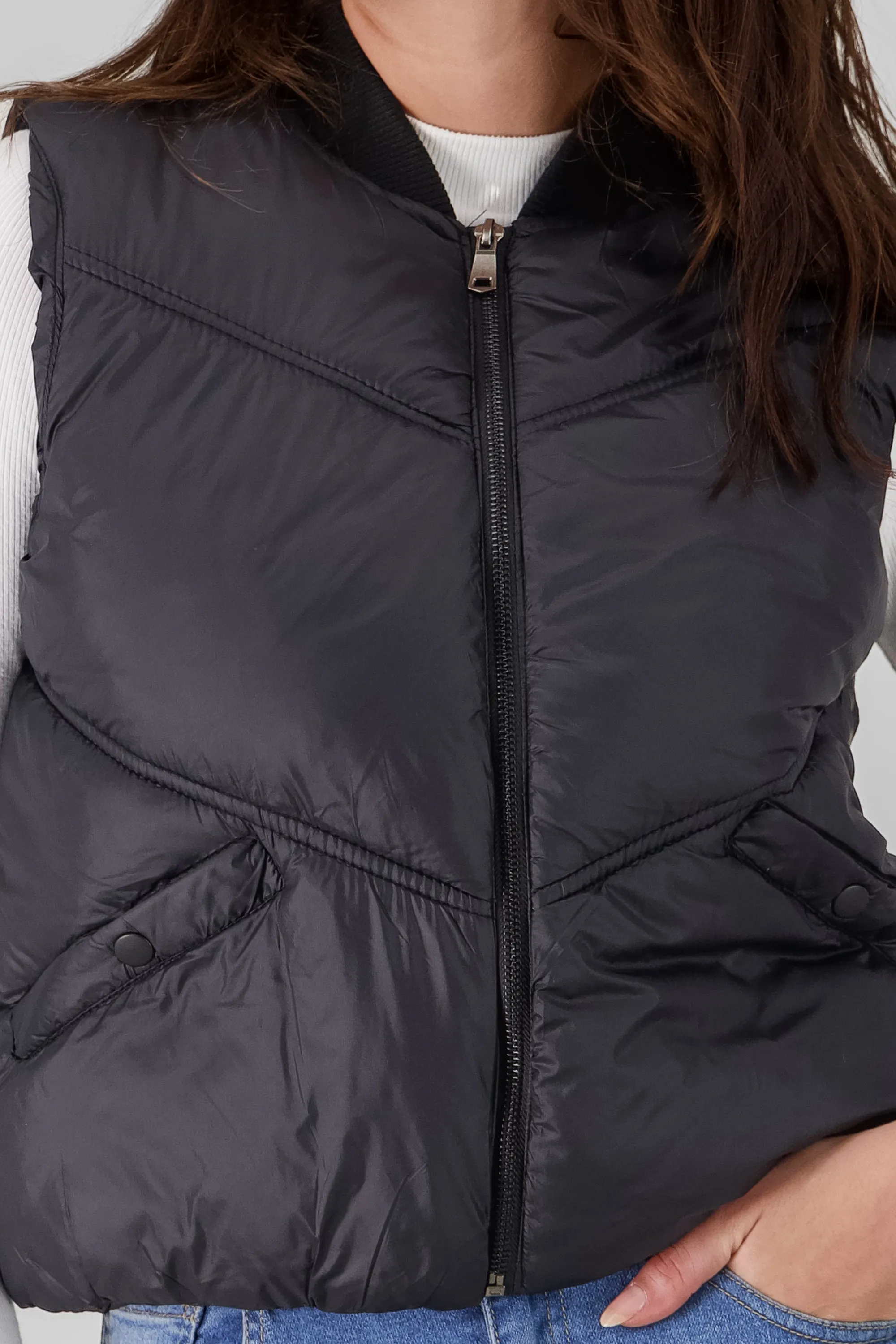 Chaleco mini puffer liso con bolsas sold by Shasa product image thumbnail 5