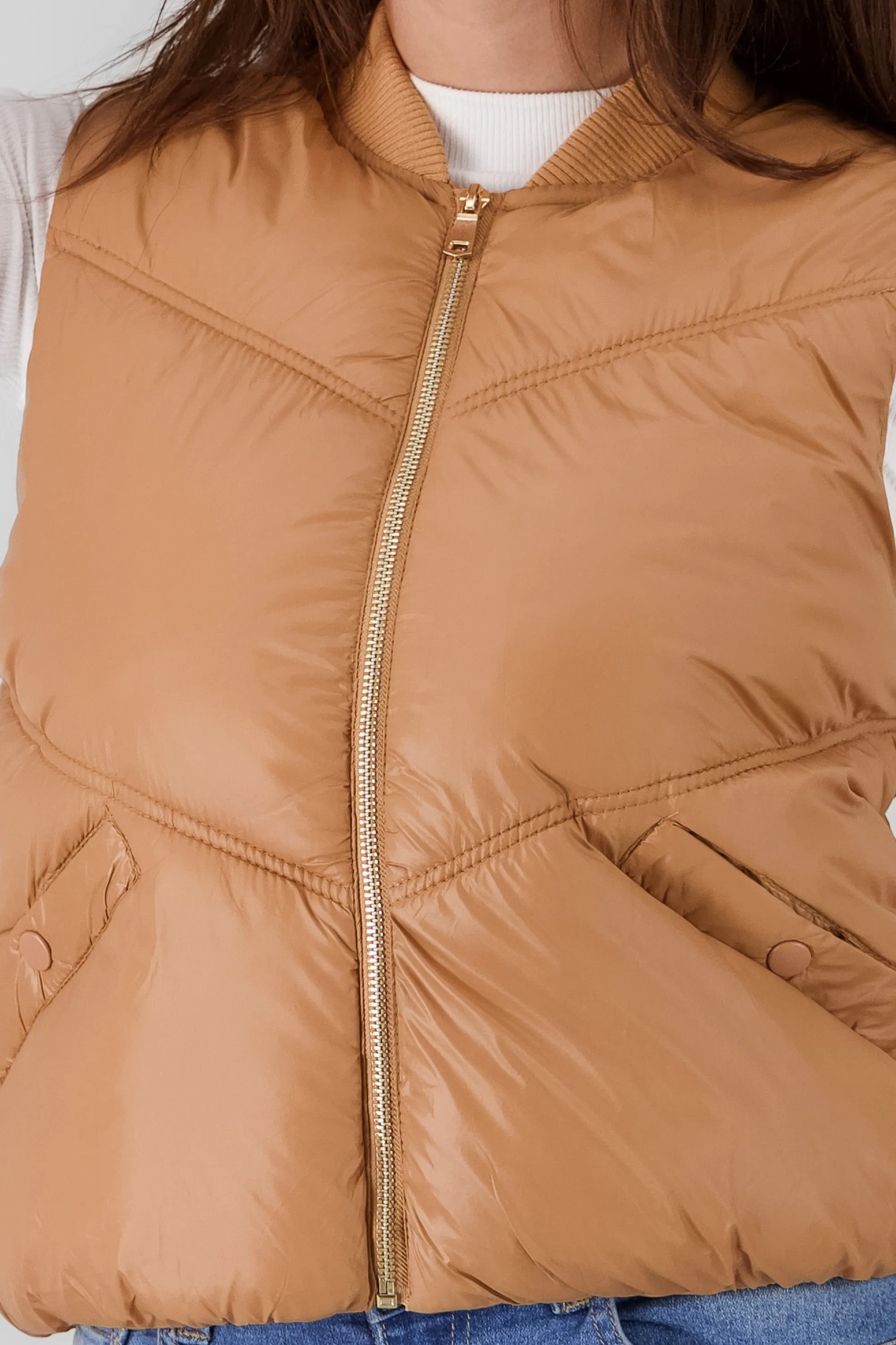 Chaleco mini puffer liso con bolsas sold by Shasa product image thumbnail 5