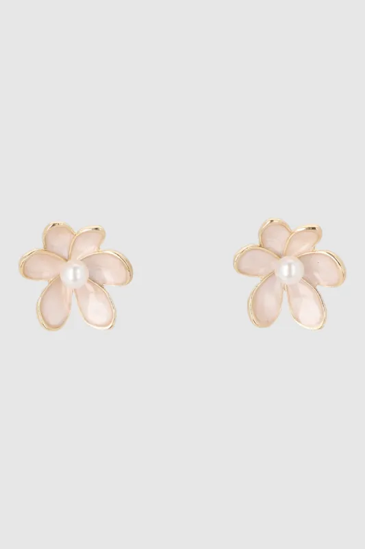 Aretes flores metalica nacarada sold by Shasa
