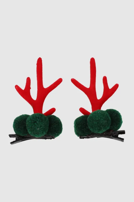 Set 2 broches pompón cuernos sold by Shasa