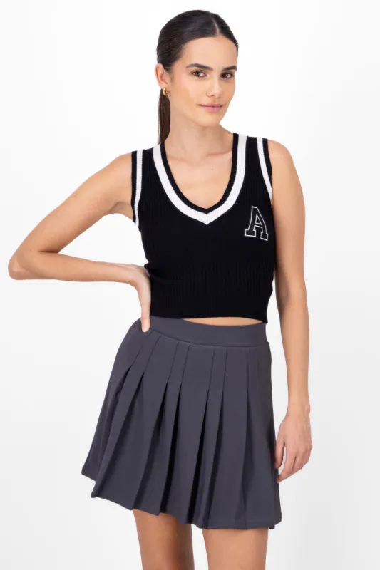 Chaleco tejido contraste con parche sold by Shasa