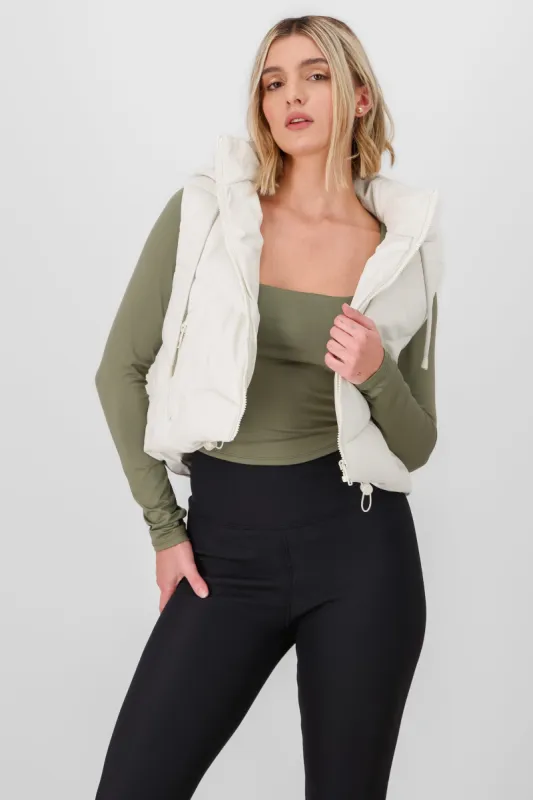 Chaleco capitonado con gorro pu sold by Shasa