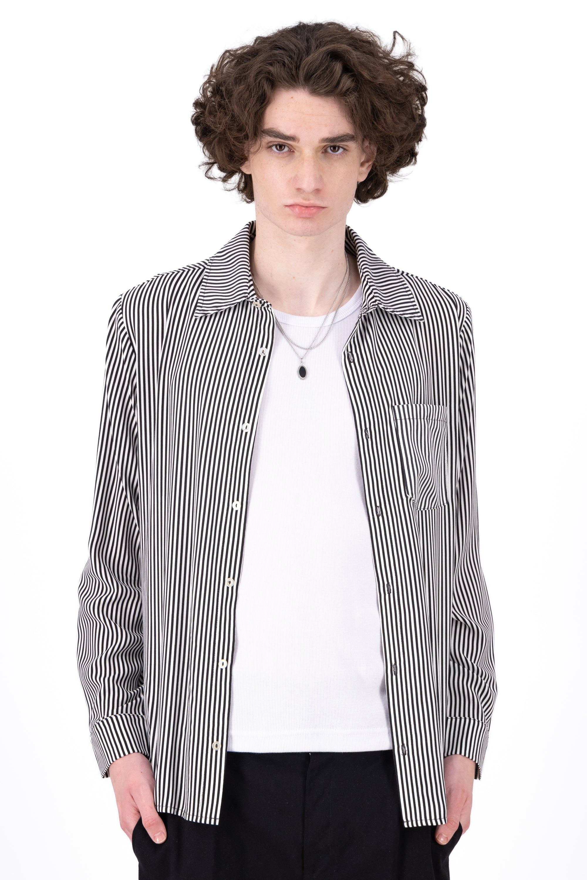 Camisa manga larga rayas sold by Shasa