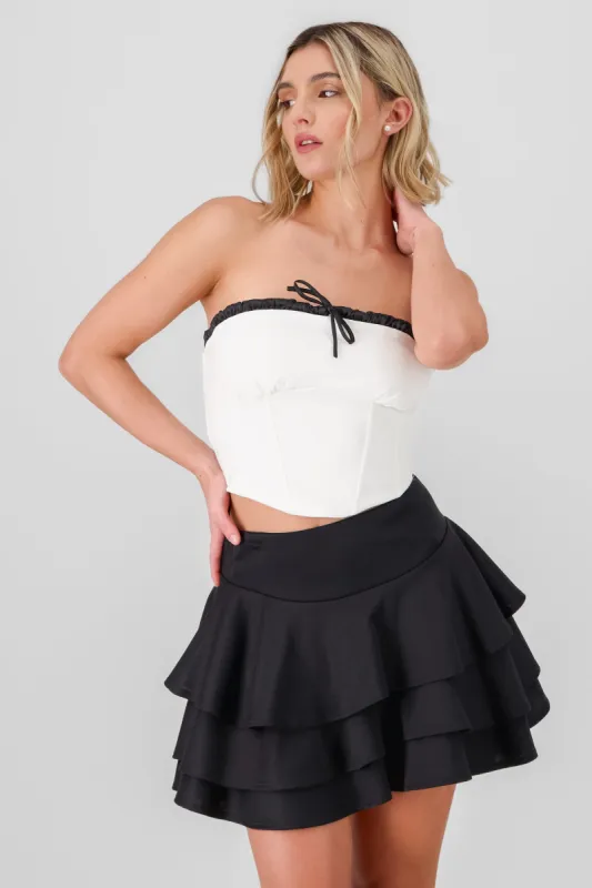 Top bandeau contraste con moño sold by Shasa