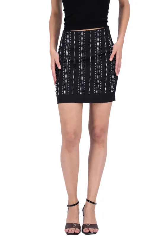 Falda mini brillos sold by Shasa