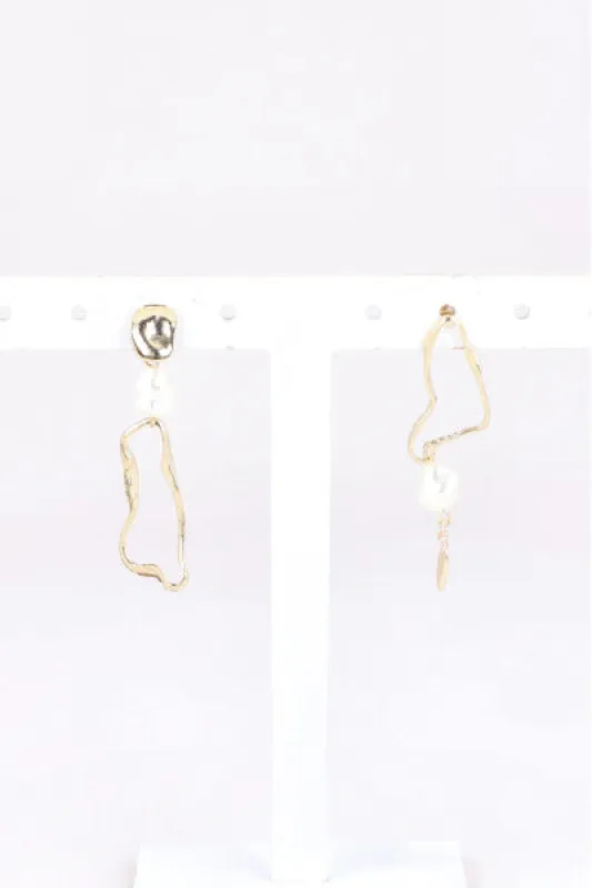 Aretes Perlas Derretido sold by Shasa