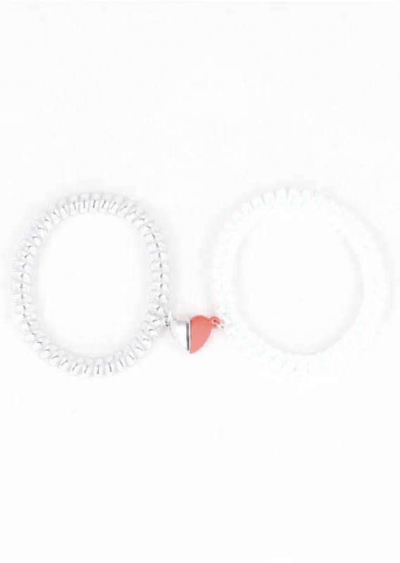 Set Pulseras Telefono Corazon Iman sold by Shasa