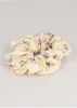 Scrunchie Mariposas sold by Shasa